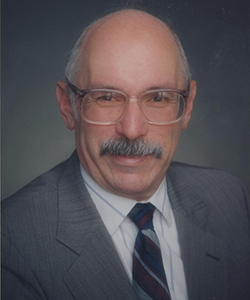 Headshot of Dr. Marvin Cassman.